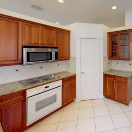 Rent this 4 bed apartment on 17033 Southwest 52Nd Street in Riviera Isles, Miramar