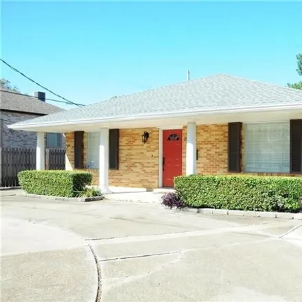 Rent this 2 bed house on 219 Harrison Avenue in Lakeview, New Orleans