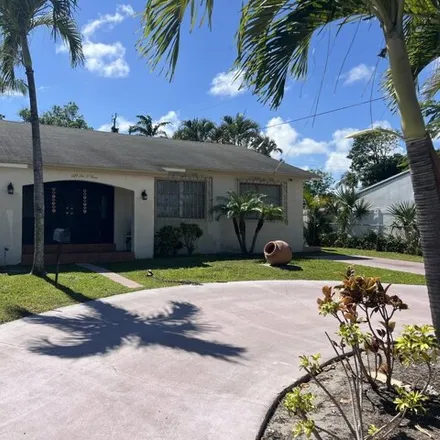 Rent this 3 bed house on 5615 Parker Avenue in West Palm Beach, FL 33405