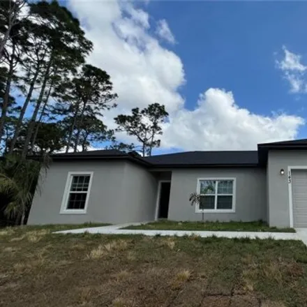 Rent this 3 bed house on 143 Feldman Street Southeast in Palm Bay, FL 32909
