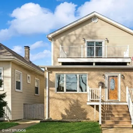 Buy this 4 bed house on 3822 North Oketo Avenue in Chicago, IL 60656