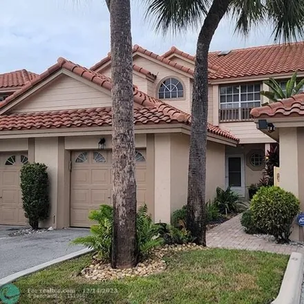 Rent this 2 bed townhouse on Cypress Glen Drive in Coral Springs, FL 33071