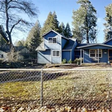 Buy this 4 bed house on 11180 Cedar Ridge Dr in Grass Valley, California