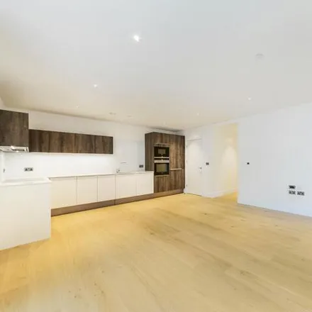 Rent this 3 bed room on St Joseph's Street in London, SW8 4EQ