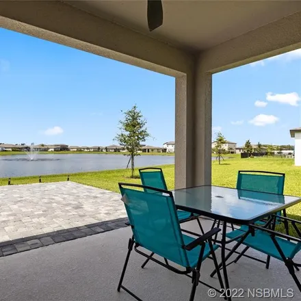 Buy this 4 bed house on 3118 Crab Trap Drive in Coastal Woods, New Smyrna Beach