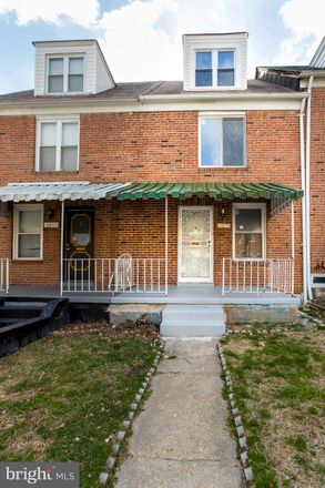Rent this 3 bed townhouse on 3215 Lake Avenue in Baltimore, MD 21213