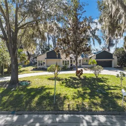 Buy this 3 bed house on 1261 West Lakeshore Drive in Clermont, FL 34711