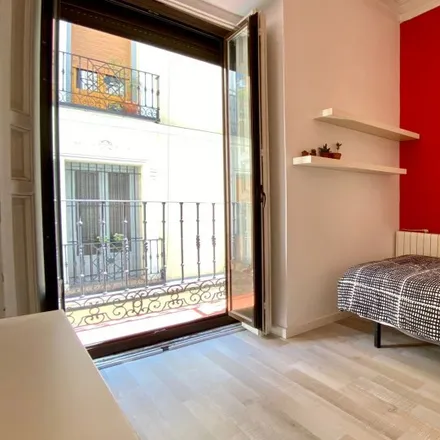 Rent this 7 bed room on La Colada in Calle de Juanelo, 28012 Madrid
