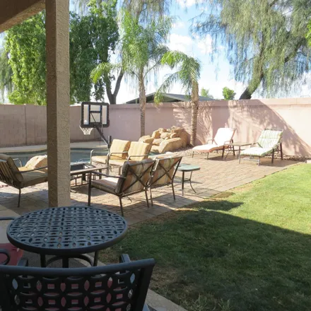 Buy this 6 bed house on 10426 East Dolphin Avenue in Mesa, AZ 85208