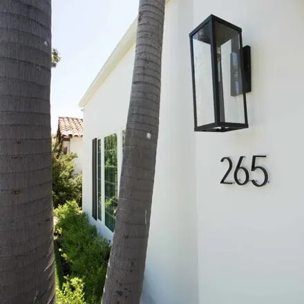 Rent this 4 bed house on 287 South Maple Drive in Beverly Hills, CA 90212