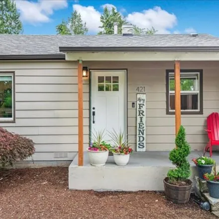 Buy this 4 bed house on 421 SW 6th Ave in Canby, Oregon