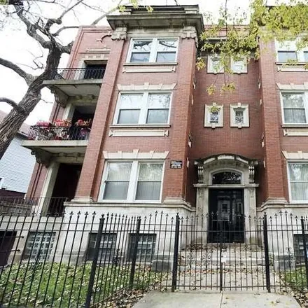 Rent this 4 bed house on 5231-5233 South Michigan Avenue in Chicago, IL 60653