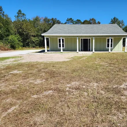 Buy this 3 bed house on 971 Northeast 424 Avenue in Dixie County, FL 32680