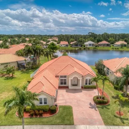 Buy this 4 bed house on 800 Southwest Lake Charles Circle in Port Saint Lucie, FL 34986