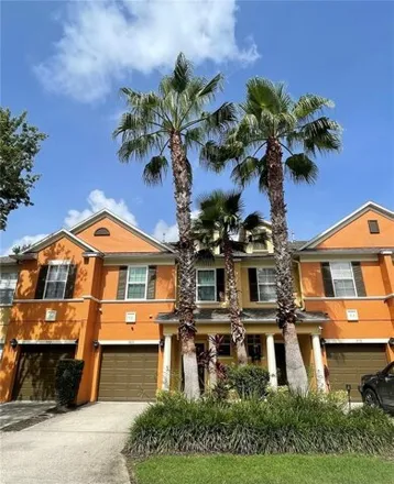 Buy this 3 bed townhouse on 880 Assembly Ct in Reunion, Florida