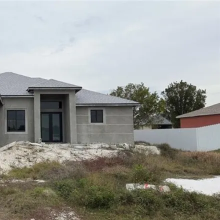 Buy this 3 bed house on 1303 Northwest 14th Avenue in Cape Coral, FL 33993