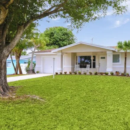 Buy this 3 bed house on 4038 Bluebell Street in North Palm Beach, FL 33410