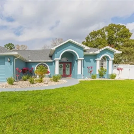Buy this 3 bed house on 13251 Enchantment Drive in Spring Hill, FL 34609