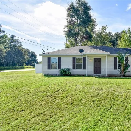 Buy this 3 bed house on 87 Dogwood Drive Loop in Marion County, FL 34472
