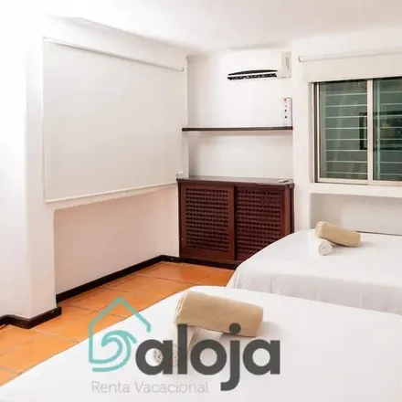 Rent this 3 bed apartment on Colectivos cancun to playa del Carmen in Avenida Tulúm, Smz 15