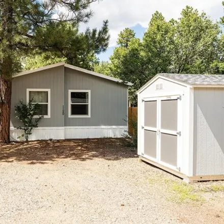 Buy this studio apartment on 566 Coyote Road in Munds Park, Coconino County