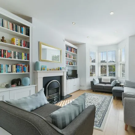 Rent this 4 bed house on Harcourt Road in London, SW19 1PB
