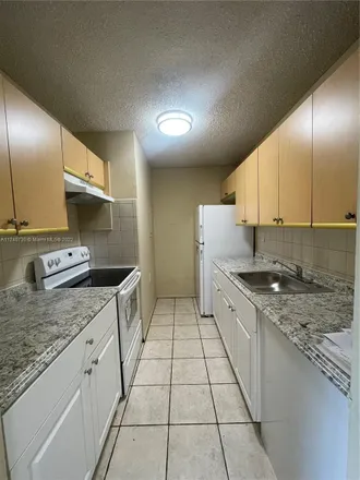 Rent this 3 bed condo on 1204 Lake Victoria Drive in Golden Lakes, Palm Beach County