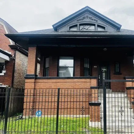 Rent this 3 bed house on 1036 North Lawler Avenue in Chicago, IL 60651