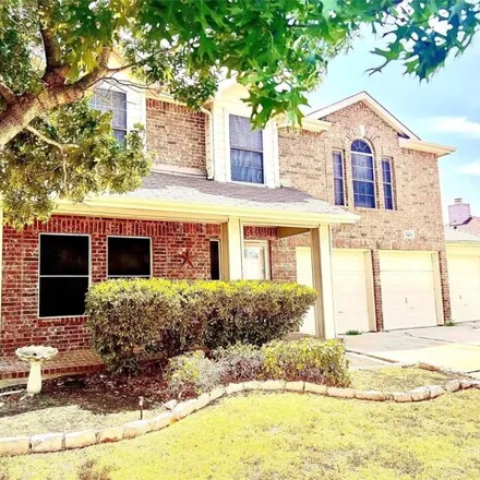 Rent this 4 bed house on 7417 Fossil Garden Drive in Arlington, TX 76002
