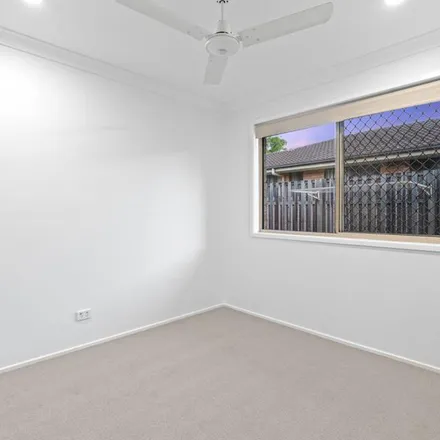 Rent this 4 bed apartment on 17 Mimosa Street in Parkinson QLD 4115, Australia