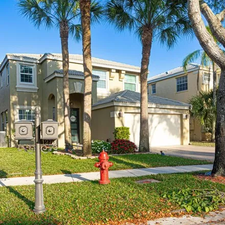 Rent this 4 bed house on 1270 Gembrook Ct in Royal Palm Beach, Florida