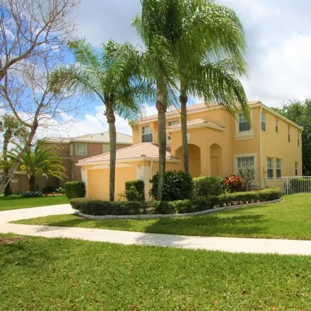 Rent this 4 bed house on 241 Saratoga Boulevard East in Royal Palm Beach, Palm Beach County