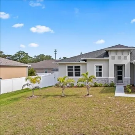 Buy this 3 bed house on 215 Dolphin Street Southeast in Palm Bay, FL 32909