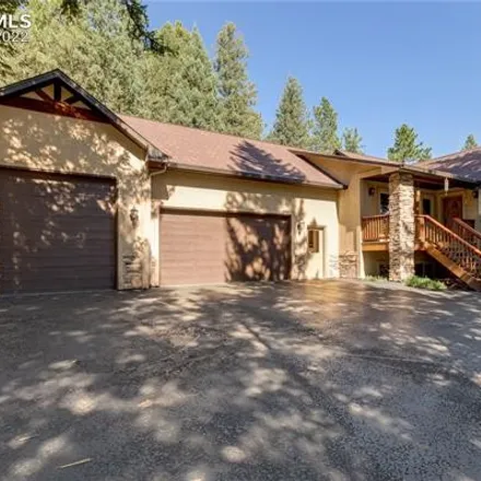 Buy this 4 bed house on 1301 Spruce Ridge Lane in Woodland Park, CO 80863
