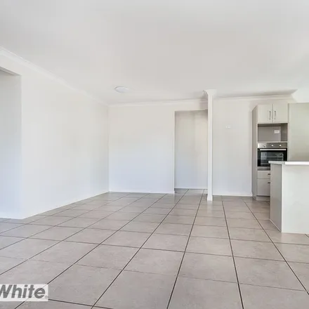 Rent this 3 bed townhouse on Goodrich Road East in Griffin QLD 4503, Australia