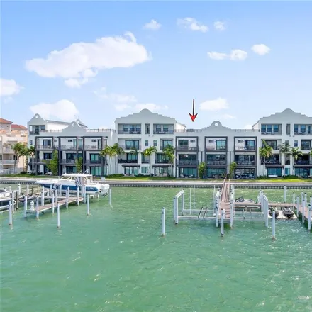 Buy this 3 bed townhouse on Sea Pines Apartment Motel in 134 Brightwater Drive, Clearwater Beach