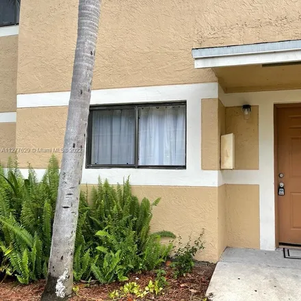 Rent this 2 bed townhouse on 320 Palm Circle East in Pembroke Pines, FL 33025