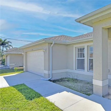 Rent this 4 bed house on 10 Northeast 20th Street in Cape Coral, FL 33909