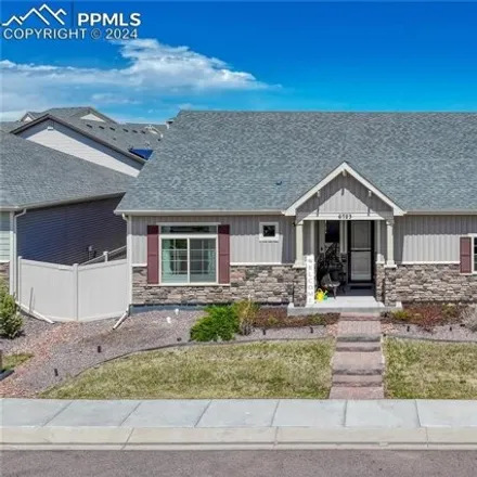 Buy this 4 bed house on 6735 Windbrook Court in Colorado Springs, CO 80927