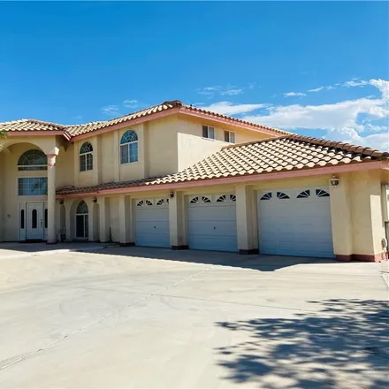 Buy this 4 bed house on 8325 West La Madre Way in Las Vegas, NV 89149
