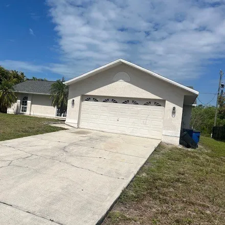 Rent this 3 bed house on 18428 Fuchsia Rd in Fort Myers, Florida