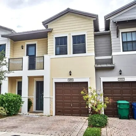 Buy this 4 bed townhouse on 5890 Northwest 104th Path in Doral, FL 33178