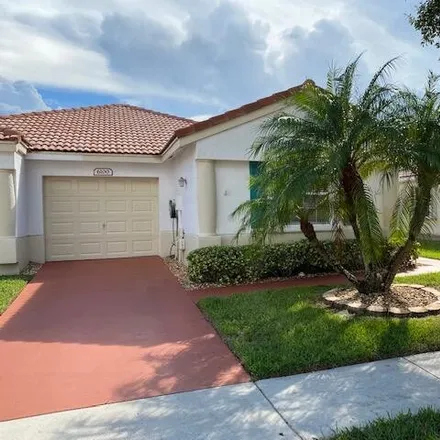 Buy this 3 bed townhouse on 6092 Petunia Road in Kings Point, Palm Beach County