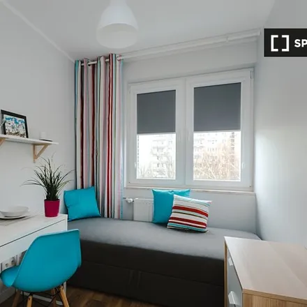 Rent this 6 bed room on Aleja Lotników 15 in 02-668 Warsaw, Poland