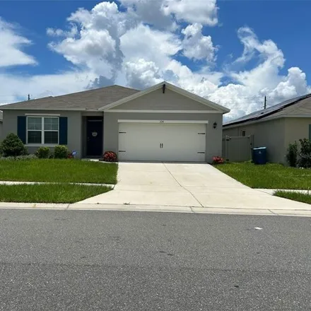 Rent this 4 bed house on 324 Boardwalk Ave in Haines City, Florida