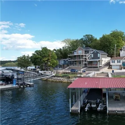Buy this 4 bed house on 6 Pleasure Point Circle in Lake Ozark, MO 65049