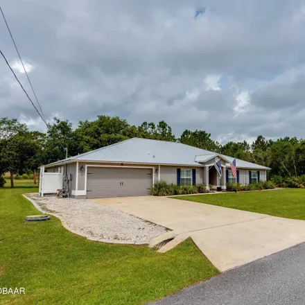 Buy this 5 bed house on 74 Lee Drive in Palm Coast, FL 32137