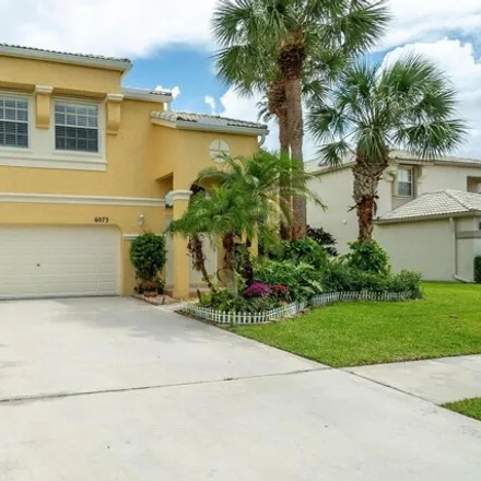 Buy this 4 bed house on 6073 Branchwood Dr in Lake Worth, Florida