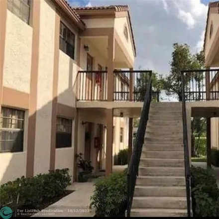 Buy this 2 bed condo on 11054 Royal Palm Boulevard in Coral Springs, FL 33065