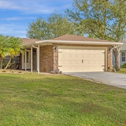 Buy this 3 bed house on 1265 Ashland Avenue Southeast in Palm Bay, FL 32909